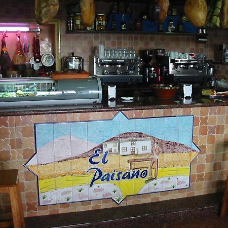 Hostal-Restaurante El Paisano Guadalema de los Quinteros Екстериор снимка
